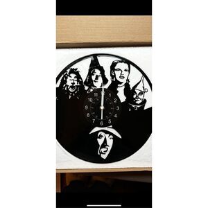 The Wizard of Oz 12”Black Lp wall clock . Battery  operated .